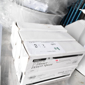 Boxes of Acopa Edgewood 7" 18/0 stainless steel heavy weight dessert spoons, 12 per case, marked as scratch and dent.