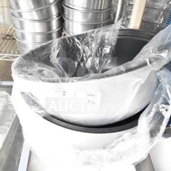 Brand new rice cooker insert in protective plastic, labeled as "X-2". Scratch and dent condition. Quantity: 2 items.