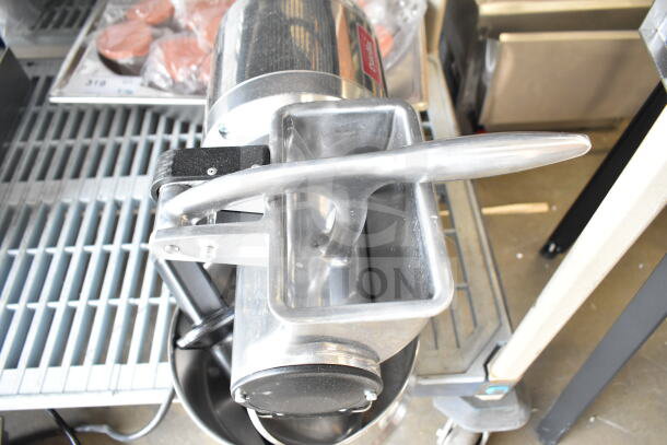 BRAND NEW Estella 348CG1NB electric hard cheese grater, 2.5 lbs/min, 110V, with minor cosmetic dents.