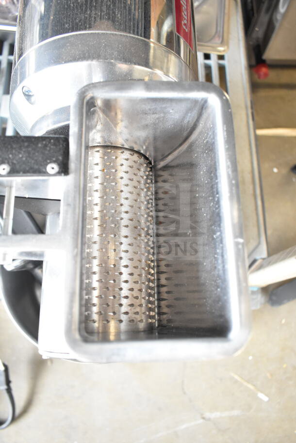 Brand new Estella 348CG1NB electric cheese grater, 2.5 lb/min, 110V, slight scratches, stainless steel, tag visible.