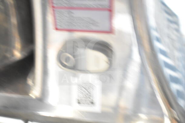 BRAND NEW Estella 348CG1NB electric hard cheese grater, 2.5 lb/min, 110V, 1 phase. Scratch and dent condition.