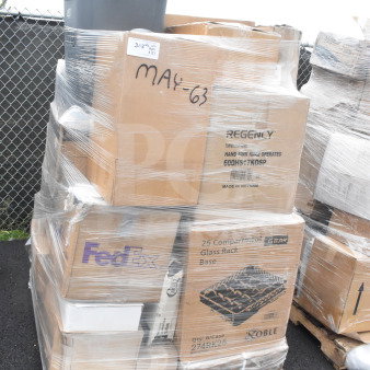 Pallet of 32 scratch and dent items, including wire shelf and storage containers. Boxes labeled Regency and Noble, wrapped in plastic.