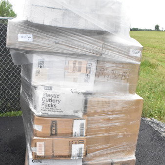 Pallet of 27 scratch and dent items, including straws, T-shirt bags, storage boxes, wrapped in plastic, marked "May26-81".