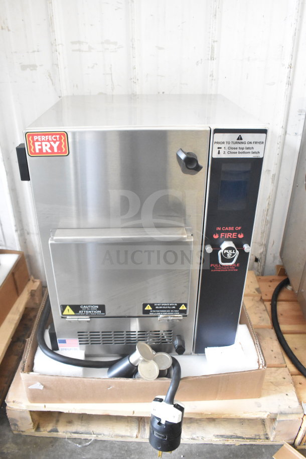 Brand new 2024 Perfect Fry PFC730 ventless countertop deep fryer, 208V, 1 phase, with visible safety and operation labels.