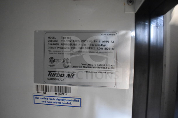 Turbo Air TBB-4SB 3 Door Back Bar Cooler label showing model, voltage, refrigerant, and certification details.