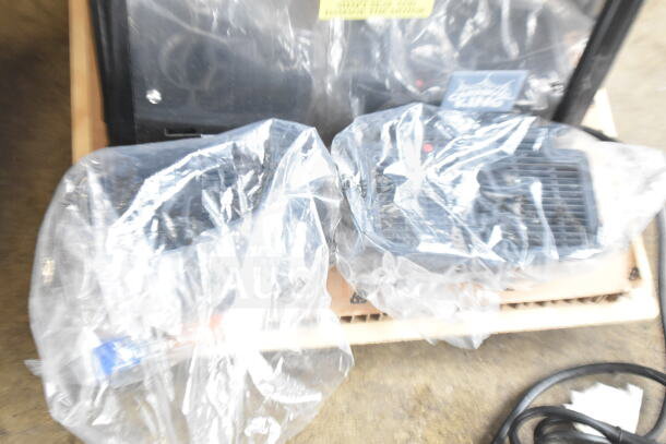 Brand new 2025 Carnival King Oasis 2-10 granita machine, 2.6-gallon, pourover, 120 volts, with minor scratches in packaging.