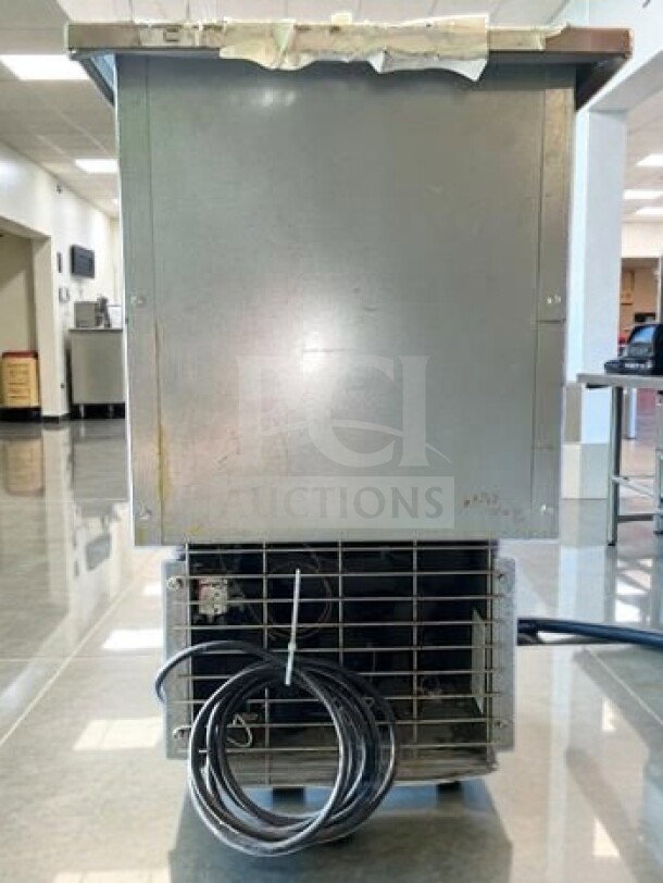 Delfield N225P 6 Gallon Drop-In Freezer, pristine condition, features stainless steel lids, 115V, NSF/cULus listed.