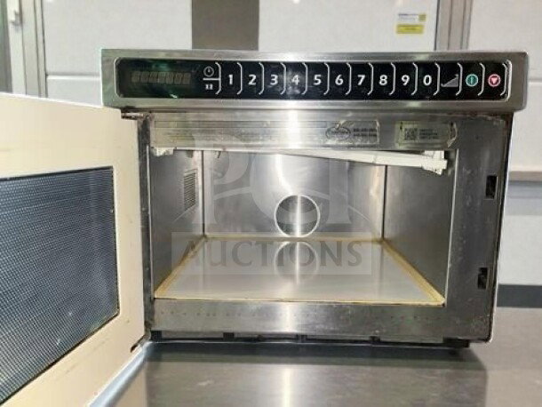 Amana HDC182 heavy-duty stainless steel commercial microwave, 0.6 cu. ft., push button controls, 1800W output, ETL listed.