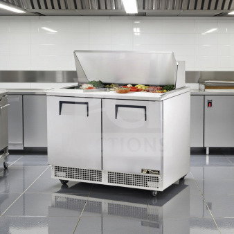 Brand new True TFP-48-18M-HC prep table, 48" wide, refrigerated base, 18-pan capacity, NSF/UL listed, fully operational.