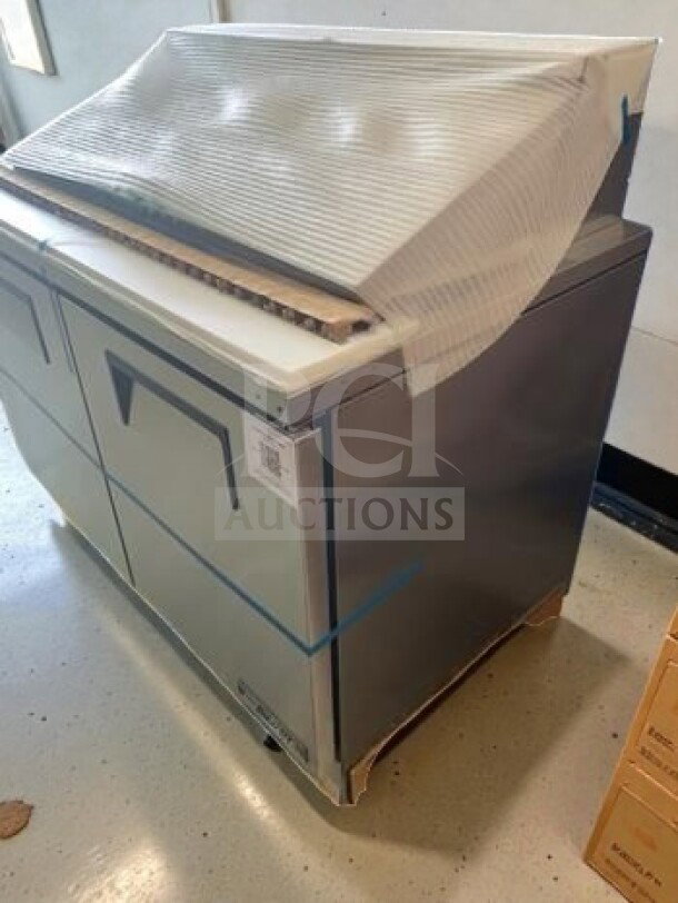 Brand new True TFP-48-18M-HC 48" Mega Top Sandwich Prep Table, 18 pan capacity, refrigerated base, NSF/UL listed.