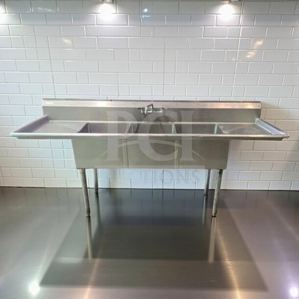 Stainless steel 3 compartment commercial sink with faucet and legs, unbranded, premium condition, inspected, model GEN-L-SINK-1071.