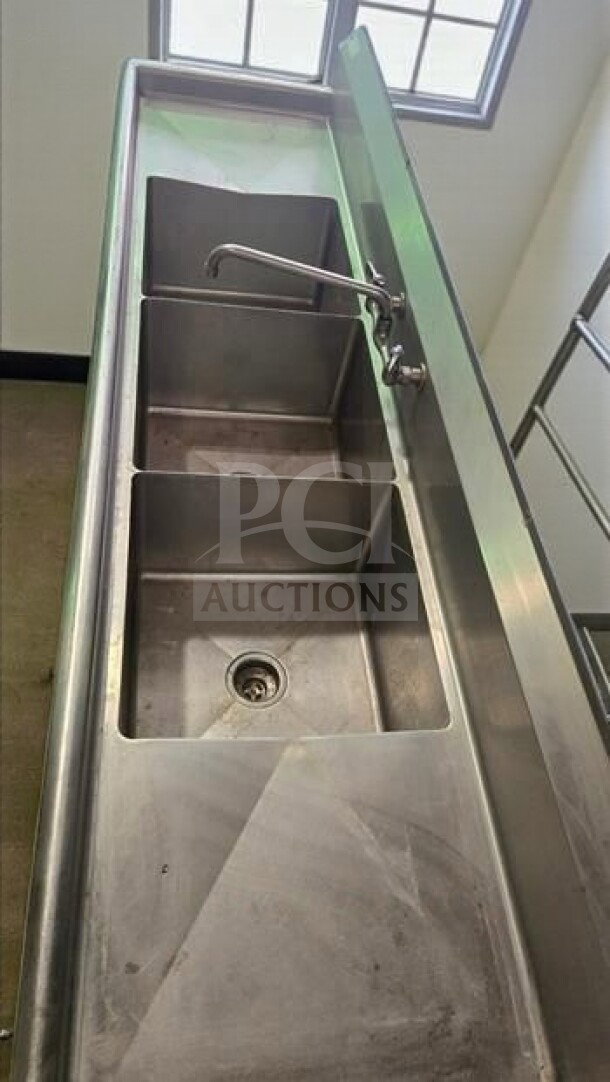 Stainless steel 3-compartment commercial sink with faucet, stainless legs, premium condition, ready for use.