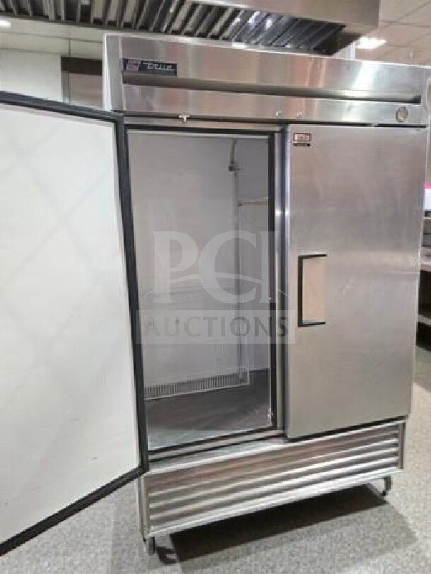 True T-49-HC 54" two-section reach-in refrigerator, stainless steel, 49 cu. ft., 2 solid doors, NSF/UL listed, fully operational.
