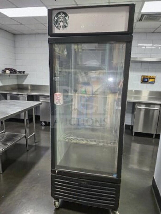 Starbucks branded beverage cooler by IDW, model G-26CSI, 23 cu. ft., glass door, excellent condition, ETL listed, 110–120V.
