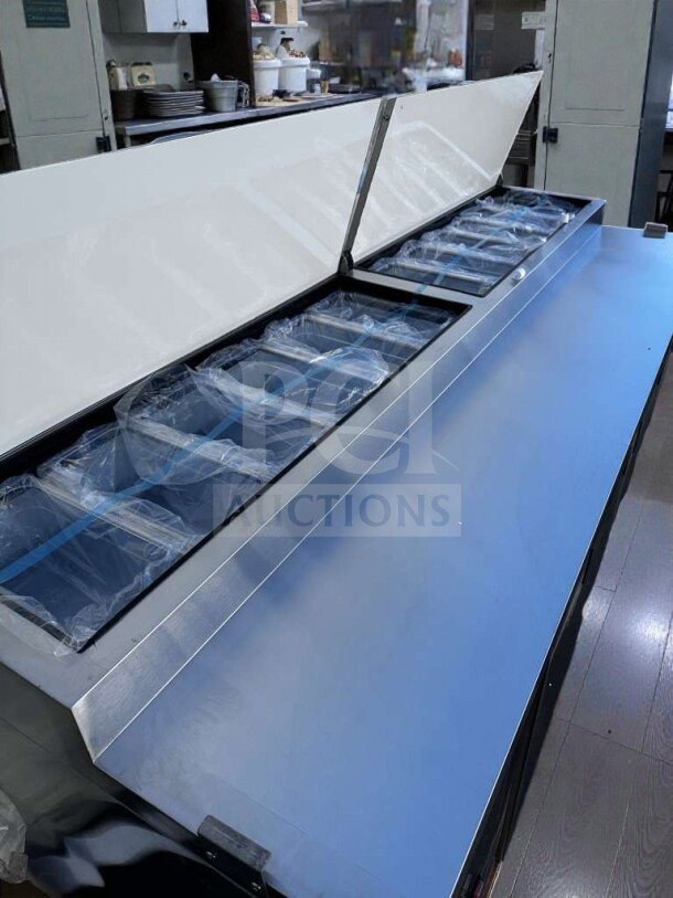 Brand new KoolMore KM-RPPS-3DSS 92" three-door pizza prep refrigerator, stainless steel, full-length cutting board.