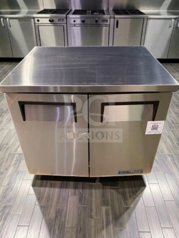 Brand new True TUC-36-HC undercounter refrigerator, 36 3/8", two solid doors, 8.5 cu. ft., NSF/UL listed, tested.