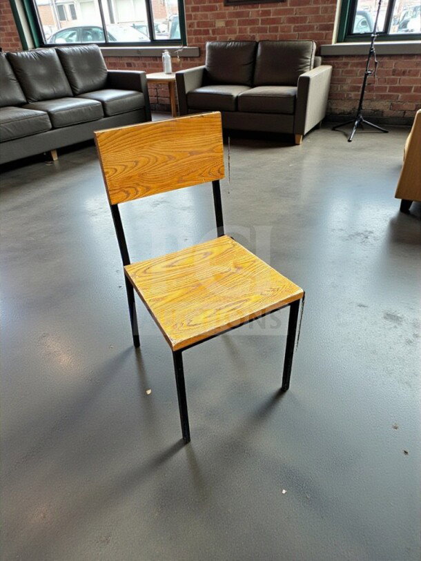 Set of 8 wood and metal dining chairs, well-maintained, wood seat and backrest, black metal frame, ready for use.