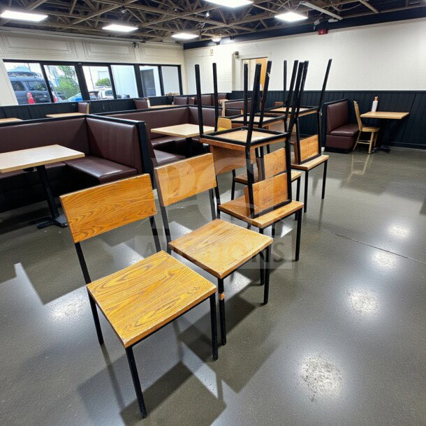 Set of 8 wood and black metal dining chairs with wood seat and backrest. Well-maintained, inspected, ready for use.