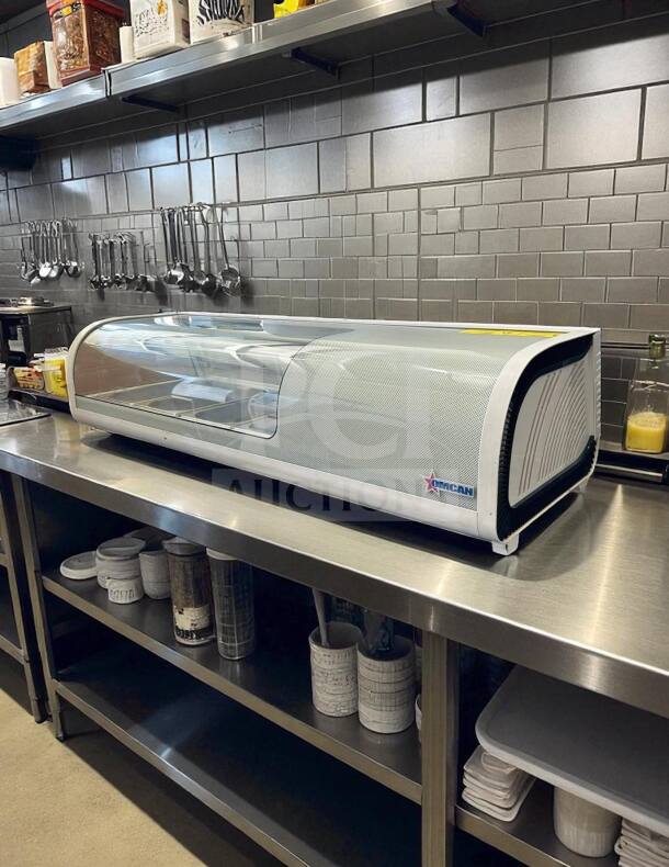 Flawless Omcan RS-CN-0042S 46" sushi showcase refrigerator, 42L capacity, 115V, fully tested, on stainless steel counter.