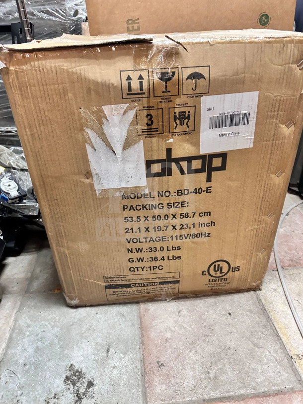 Pristine Zokop BD-40-E compact freezer/refrigerator, 1.1 cu. ft., 115V, in original box, never used, visible packing details.