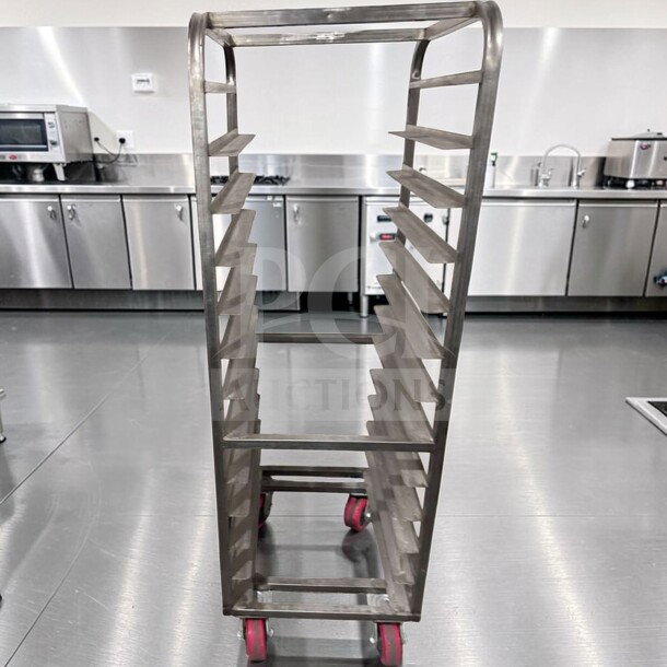 Commercial stainless steel bun pan rack, superior condition, heavy-duty with red wheels; model RACK-S-BUN-0834, fully operational.