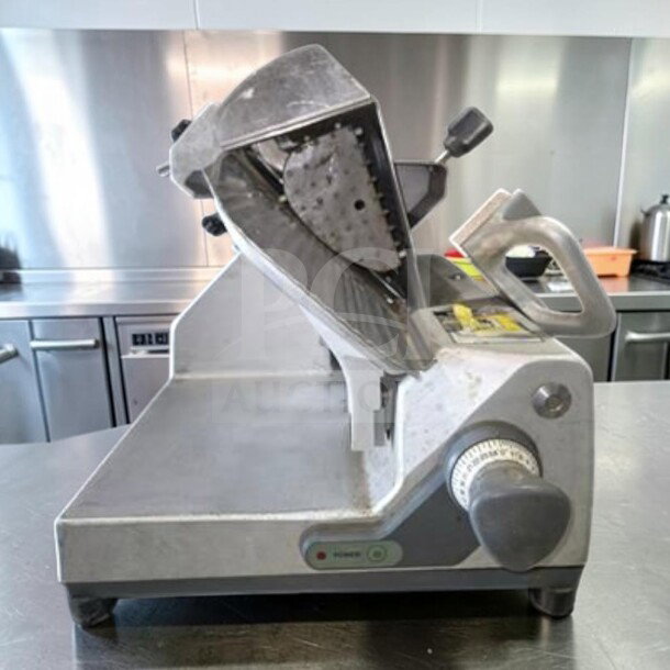 German Knife GS-12M commercial slicer, 12" blade, gravity feed, 1/2 HP, UL & NSF certified, excellent condition, fully tested.