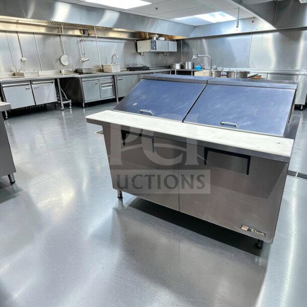 True TSSU-60-24M-B-ST-HC Mega Top Sandwich Prep Table, 60-inch, stainless steel, 2-door, fully operational, excellent condition.