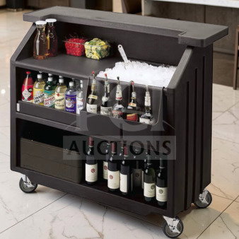 Black Cambro BAR540110 Cambar® 55” portable bar with ice bin, bottles, and wheels in top-tier condition, fully operational.
