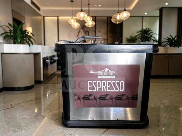 Cambro BAR540110 portable bar, 55", black, with ice bin. Commercial-grade, top-tier condition, espresso branding visible.