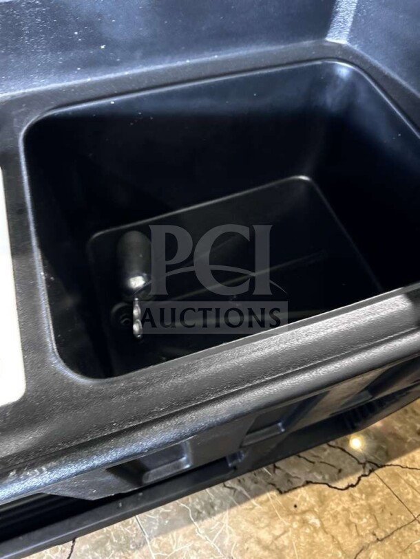 Cambro BAR540110 Cambar® 55” portable bar with ice bin, black. Commercial-grade, fully tested, excellent condition.