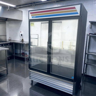 True GDM-49F-LTF-HC~TSL01 freezer merchandiser, black, glass doors, 54", 8 shelves, LED lighting, excellent condition, NSF/UL listed.