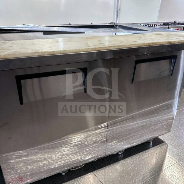 True TSSU-48-18M-B-HC sandwich prep table in outstanding condition, refrigerated base, 48", fully tested, 115V.