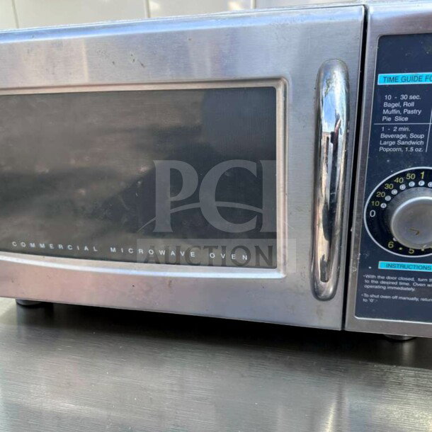 Sharp R-21LCFS commercial microwave oven in top-tier condition, stainless steel, 1000W, dial control, tested operational.
