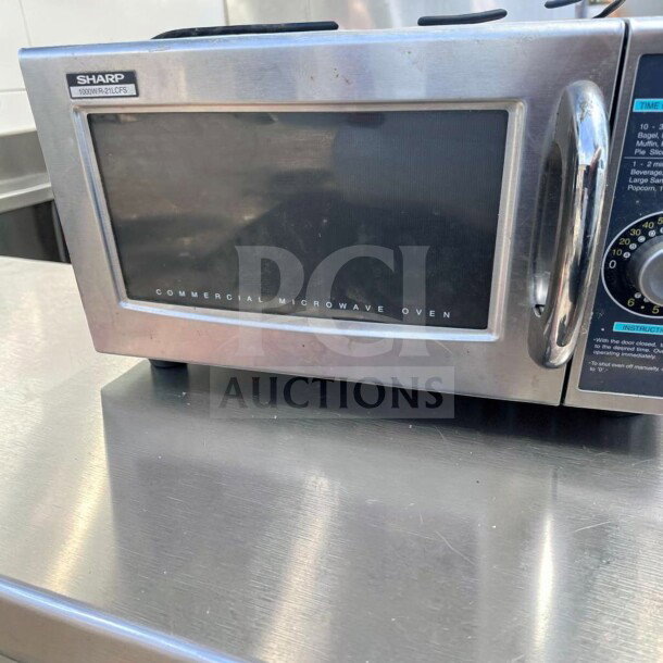 Sharp R-21LCFS Commercial Microwave Oven, 1000W, Stainless Steel, Dial Control, excellent condition, fully operational.