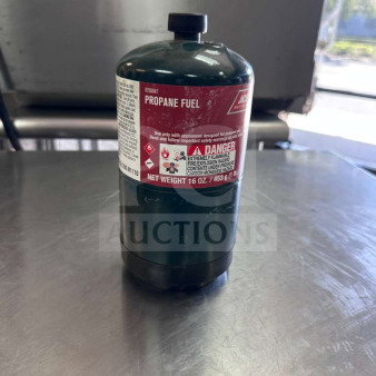 Ace Hardware 16 oz steel propane fuel cylinder in exceptional condition. Label shows model ACE-S-PROP-1007, ready for use.