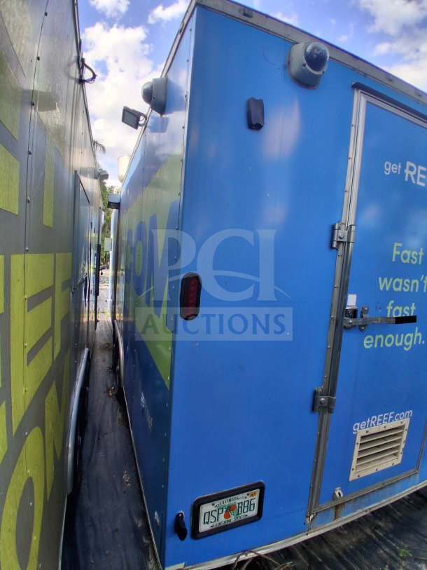 Blue 2020 Diamond Cargo 24' Custom Mobile Kitchen, featuring professional-grade appliances and stainless steel interior.