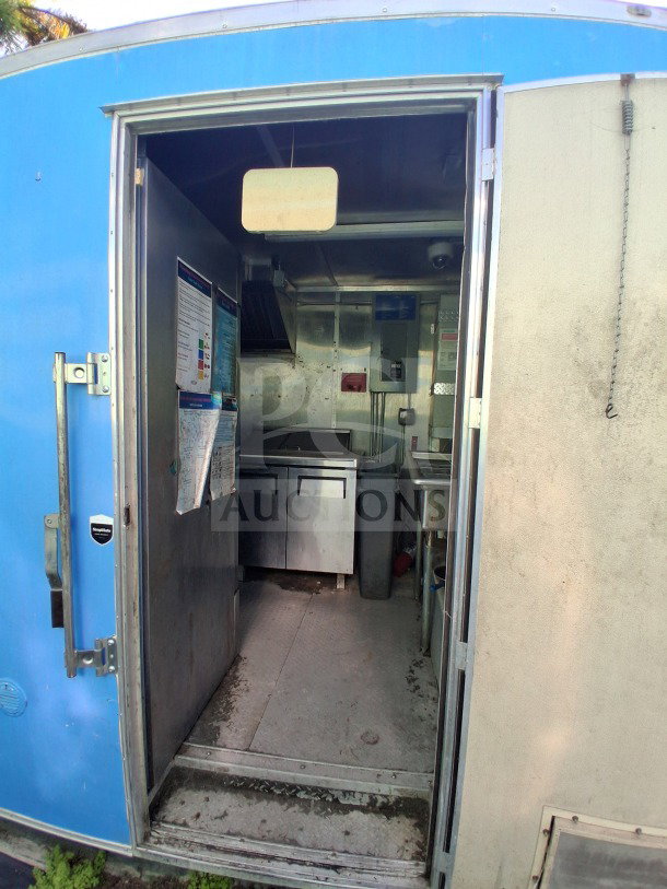 2020 Diamond Cargo 24' Custom Mobile Kitchen, blue exterior, stainless steel interior, features Pitco fryers and commercial griddle.