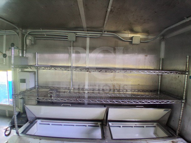 2020 Diamond Cargo 24' Custom Mobile Kitchen, stainless steel interior, shelving, refrigeration units, commercial-grade setup.