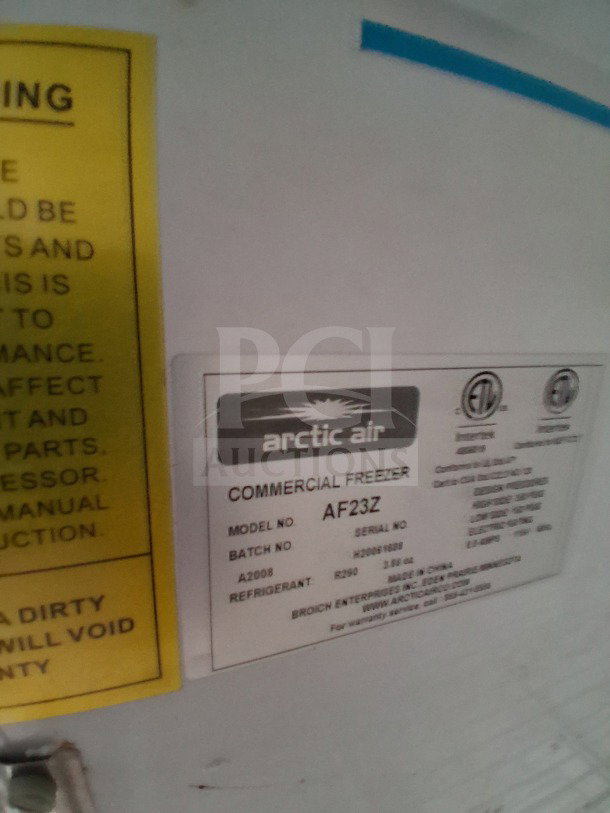 Label on Arctic Air commercial freezer, model AF23Z, showing batch number A2008, refrigerant R290, and serial details.
