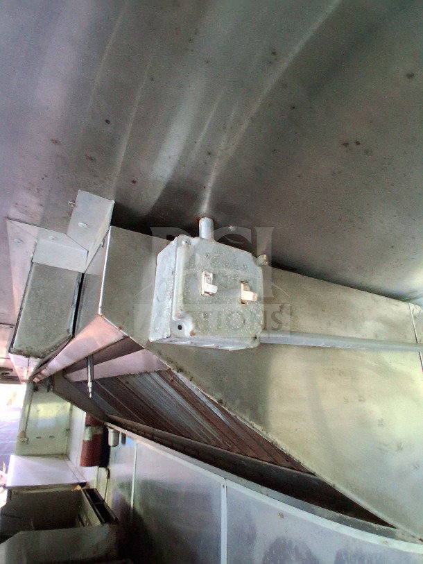Stainless steel interior of 2020 Diamond Cargo 24' Mobile Kitchen with Pyro-Chem fire suppression system visible.