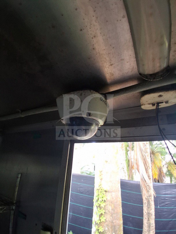 Ceiling-mounted security camera inside a 2020 Diamond Cargo 24' Custom Mobile Kitchen.