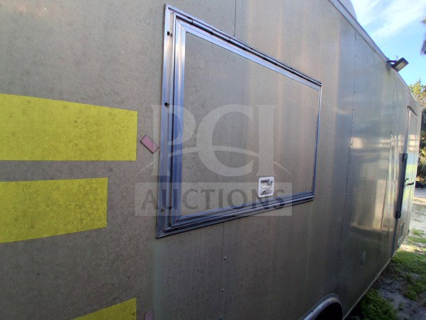 2020 Diamond Cargo 24' Mobile Kitchen with beige/yellow wrap, stainless steel interior, Arctic Air Refrigeration, fire suppression system.