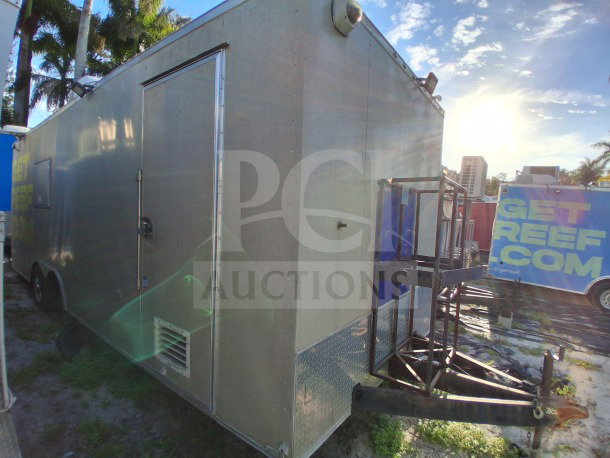 2020 Diamond Cargo 24' mobile kitchen, beige and yellow wrap, stainless interior, equipped with Pitco fryers and Pyro-Chem system.