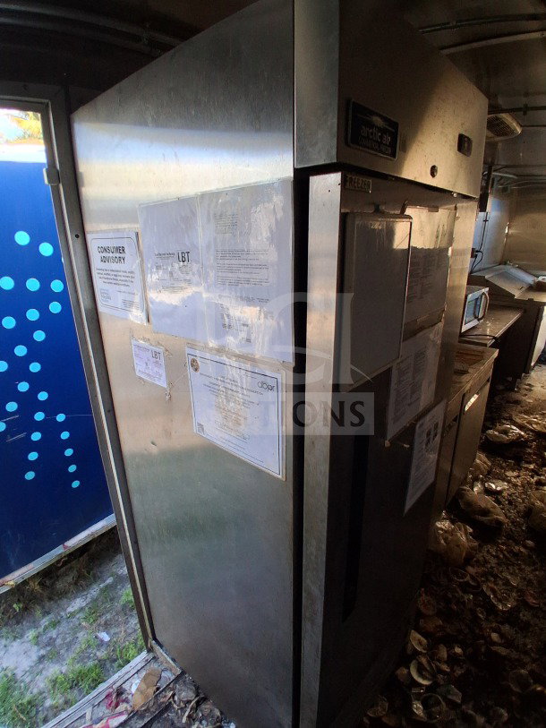 Arctic Air Refrigeration unit inside a 2020 Diamond Cargo 24' Custom Mobile Kitchen. Stainless steel exterior with visible labels.