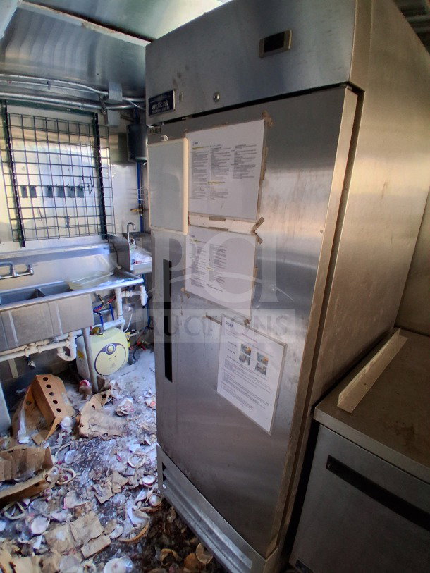 2020 Diamond Cargo 24' Custom Mobile Kitchen interior with stainless steel Arctic Air fridge, showing detailed equipment setup.
