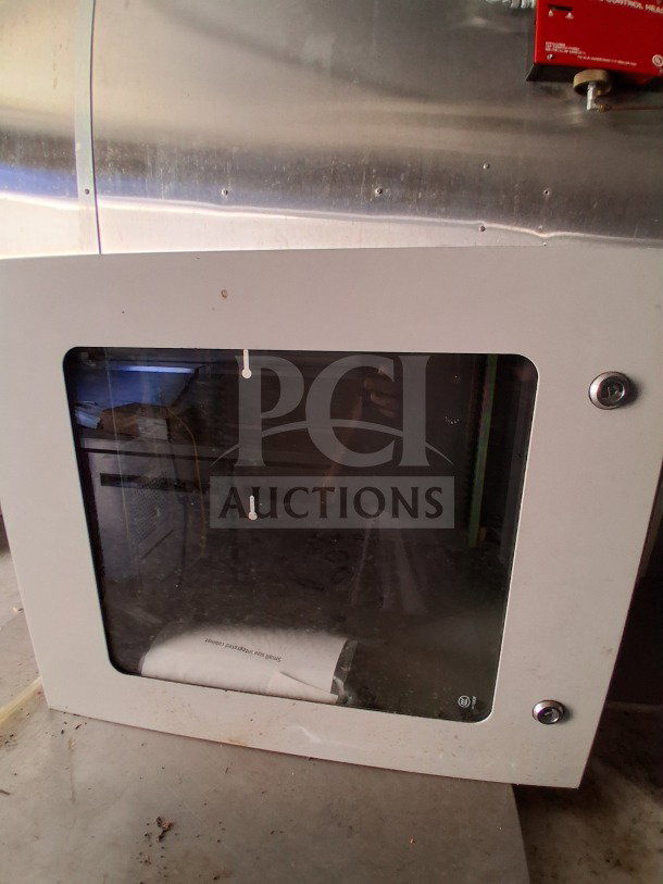 2020 Diamond Cargo 24' Custom Mobile Kitchen interior view, Pyro-Chem fire suppression panel, stainless steel finish.