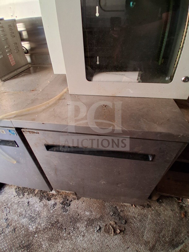 2020 Diamond Cargo 24' Custom Mobile Kitchen interior showing stainless steel surfaces and commercial cooking equipment.