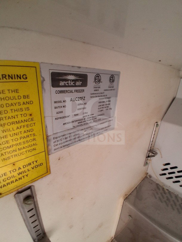 Arctic Air commercial freezer label inside 2020 Diamond Cargo 24' Custom Mobile Kitchen, showing model AUC27FZ and specifications.