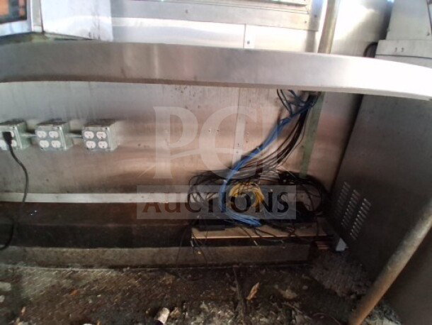 2020 Diamond Cargo 24' Custom Mobile Kitchen interior showing stainless steel finish, wiring, and electrical outlets.