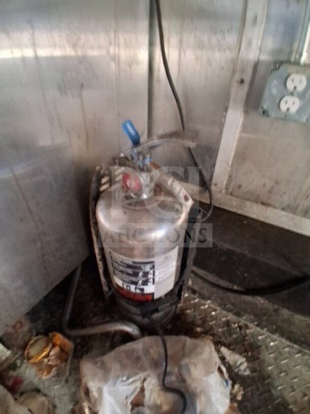 2020 Diamond Cargo 24' Mobile Kitchen, interior view showing Pyro-Chem fire suppression tank and stainless steel surfaces.